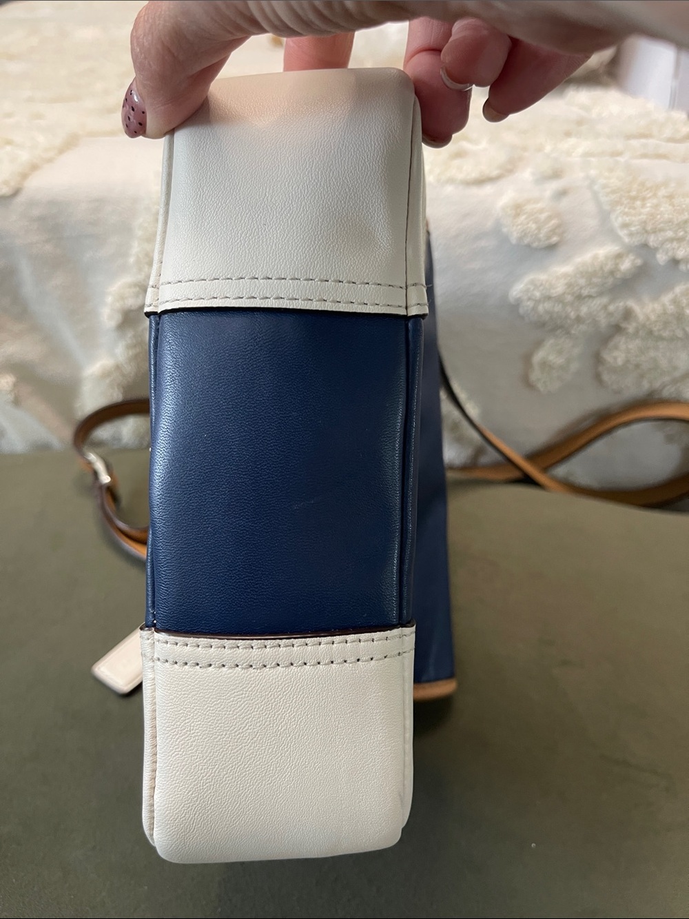 Coach Hadley leather crossbody bag in a navy, tan, and white colorblock design. - Picture 8 of 11